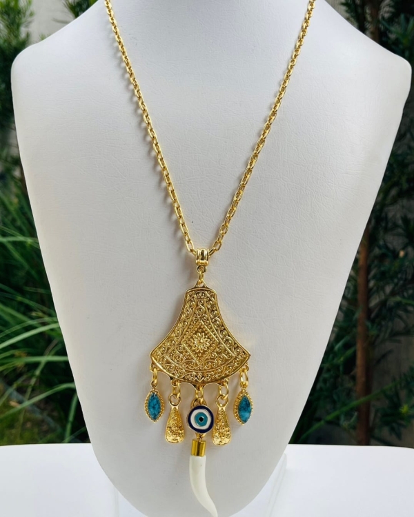 Colar Boho com Pingente de Dente Marfim e Detalhes Étnicos